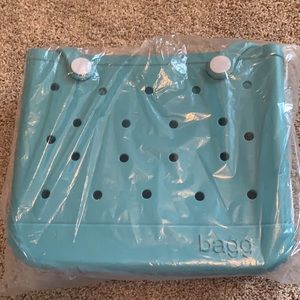 Large Versatile Rubber Travel Tote (teal).